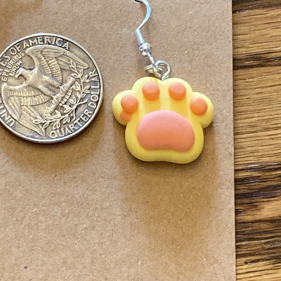 Orange and yellow dog paw earrings with silver wires and random gift bag - Picture 5 of 5